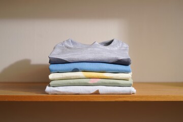 Neatly Stacked Folded Shirts
