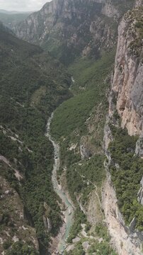 Top view of clear green river in natural canyon landscape
