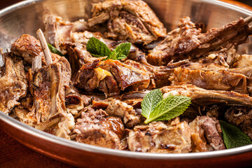 Roasted Lamb Pieces Served In Rustic Platter