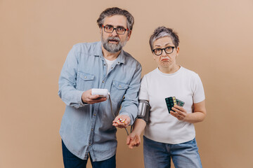 Senior couple dealing with health issues and medication