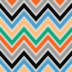 Seamless geometric zigzag chevron pattern with dotted accents in colorful stripes. Modern decorative background suitable for textile, fabric, wallpaper, wrapping paper, and surface design