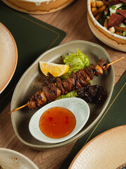 Gourmet Mexican chili con carne and beef stew with vegetables and spices served as a healthy meat meal in a bowl with beans, peppers, and tomato sauce for a delicious dinner dish