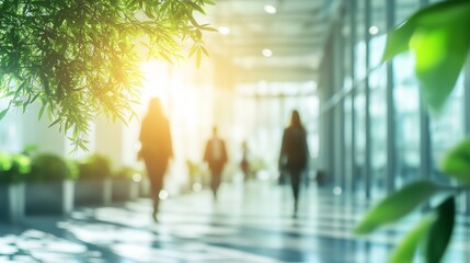 Green plants in foreground in pedestrian corridor of office building. Ecological concept