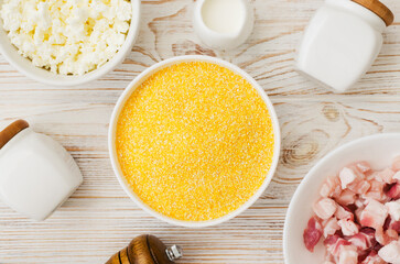 Traditional Cornmeal Dish Ingredients on Wooden Surface