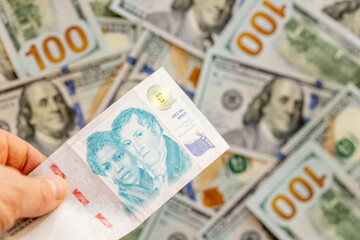 Obraz premium Argentina money. Currency exchange rate. Argentine peso vs US dollar. Value of Argentine currency. Financial business concept