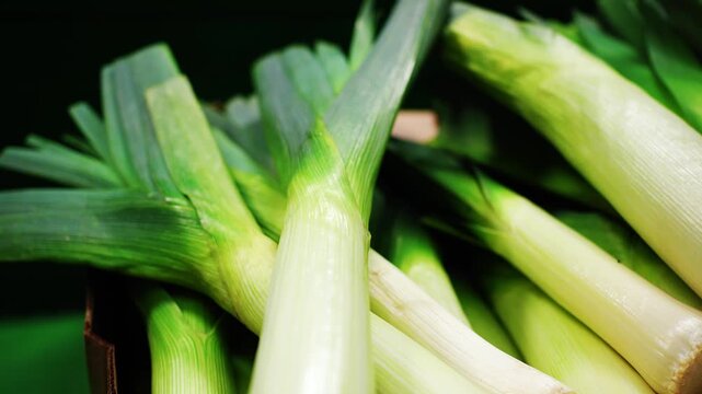 Cooking leeks in a home kitchen on a sunny afternoon