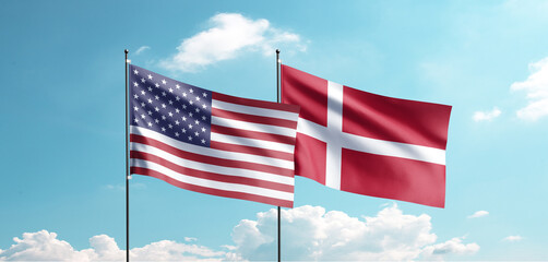 USA and Denmark Flags Flying Together Against Blue Sky