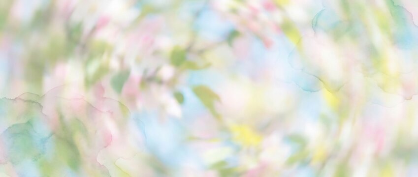 Abstract pastel watercolor background with soft spring floral colors