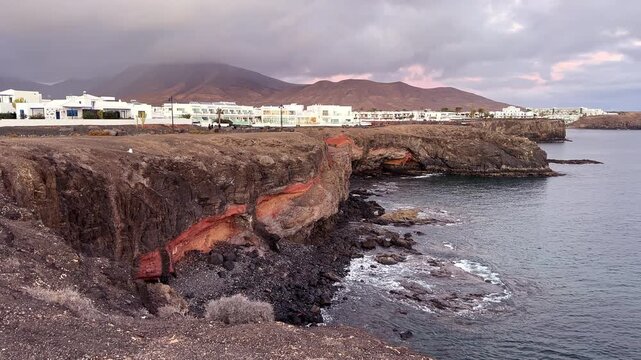 Sea Coves and Hacha Grande Mountain in Playa Blanca, Lanzarote, Canary Islands, Spain