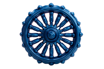 Chakra wheel with metallic finish in navy blue design resting on a plain background