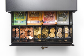 Open cash register drawer with money stacks of euro banknotes and cents coins saving and retail services isolated on white background