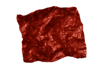 Textured red crumpled shiny metallic foil isolated