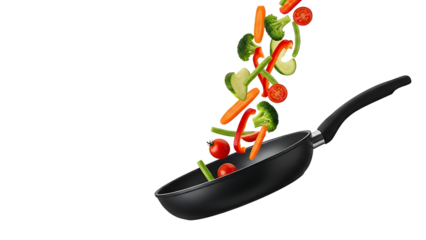 A black frying pan with colorful vegetables flying out of it on transparent background