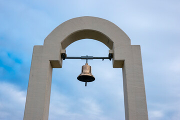 Hanging brass bell for religious purposes