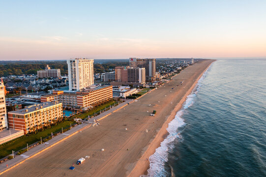 Virginia Beach Virginia - June 16 2024: Aerial View of Hotels and the North End up to Cape Henry at Sunrise in Virginia Beach