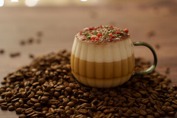steaming cappuccino cup topped with colorful sprinkles on rich coffee bean bed creating cozy warm ambiance on wooden table with soft lighting background, delight, hygge, ambiance, aromatic, layered