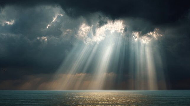 ocean with clouds and sunbeams through the clouds - Powered by Adobe
