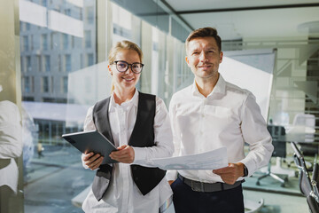 Business meeting with two colleagues in modern office