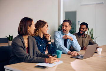 Multiracial business team having meeting in office.