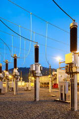 The powerful electrical infrastructure of a substation in Brazil, with its towers, insulators, and transformers.