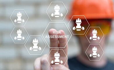 Engineer using virtual touch screen presses the text RISK ASSESSMENT. Risk Assessment Industry Business Concept. Risk analysis.