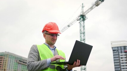 Weary construction manager is experiencing migraine attack during on-site audit