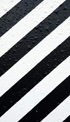 Striped black and white painted wall, close-up, detail, clean