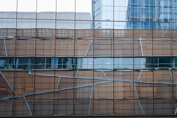 Urban landscape reflected in tower windows in Charlotte, NC