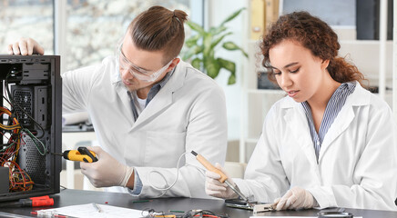 Electronic technicians working in service center