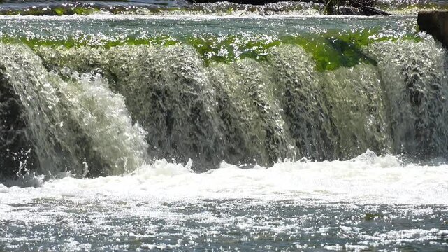 Flow of water through the spillway of a dam, 120 fps slow motion