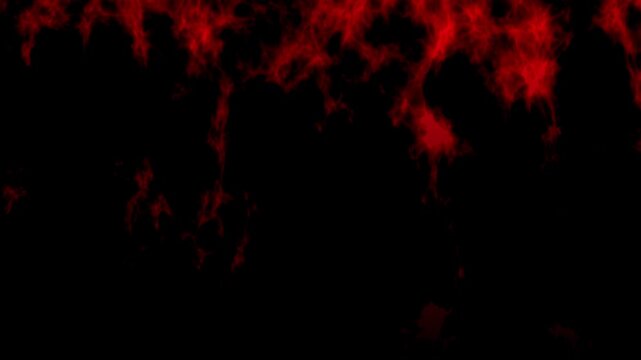 Dark red blood ink or smoke spreading downwards on a black background for horror themes.