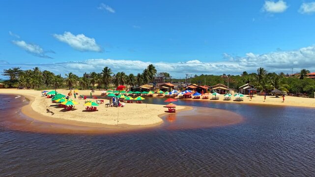 Aerial View of A&ccedil;u da Torre River Mouth (Pojuca River Estuary) meeting the Atlantic Ocean in Mata de S&atilde;o Jo&atilde;o, Bahia, Brazil.