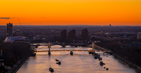 Albert Bridge panoramic view over River Thames at sunset, Chelsea London UK