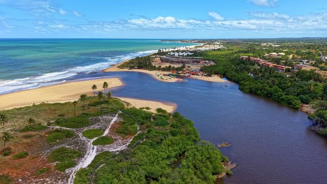 Aerial View of A&ccedil;u da Torre River Mouth (Pojuca River Estuary) meeting the Atlantic Ocean in Mata de S&atilde;o Jo&atilde;o, Bahia, Brazil.