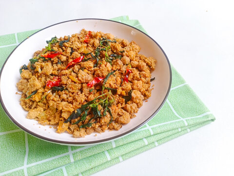 Tumis Oncom Kemangi. A popular Sundanese vegetarian dish of saut&eacute;ed oncom and basil leaves. Traditional homemade food concept