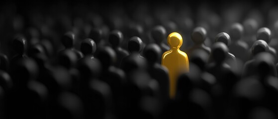 Fototapeta premium A single yellow figure stands out among a crowd of black silhouettes.