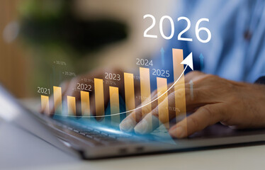 Businessman with digital arrow graph with 2026 year number, business growth, financial plan and strategy for new year 2026, marketing and profit, corporate future success and development concept