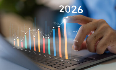Businessman with digital arrow graph with 2026 year number, business growth, financial plan and strategy for new year 2026, marketing and profit, corporate future success and development concept