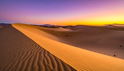 Serene desert landscape at sunset with golden sand dunes.