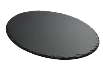Empty oval black slate serving board with rough, natural stone texture and irregular edges, isolated on a bright white background with copy space, sophisticated product display concept