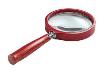 Wooden magnifying glass with a red handle isolated on a dark background