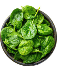Fresh spinach leaves piled high in a small wooden bowl