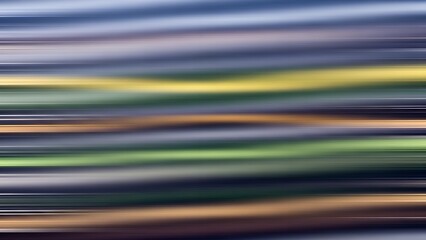 Abstract motion blur effect creating vibrant, colorful streaks across the frame, conveying dynamic energy and movement.