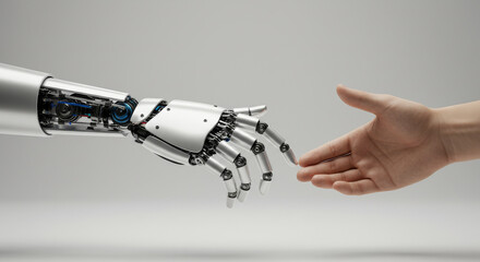 The Meeting of Minds: A close-up shot capturing the moment when a robotic arm extends to meet a human hand in a gesture of connection.