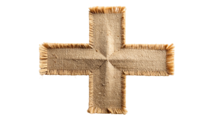 A cross made of frayed, textured beige fabric against a black backdrop