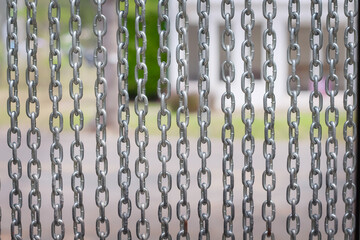 Big chain curtain hanging gray texture background