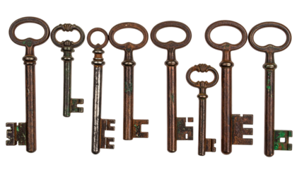 Seven antique keys with varying styles and levels of rust against black