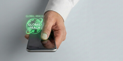 Financial high level planning concept for global reach digital network on mobile phone screen in hand closeup touch interaction