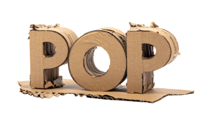 Cardboard letters spell POP, torn edges, isolated on black