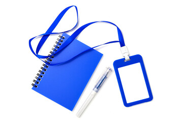 Blue plastic badge with book and pen isolated on white background. Template designed for employees and guests of company